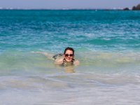 The water was so calm and pleasant you could just lie in the surf and relax.